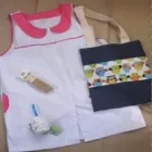 La imagen 1 de la Empresa ANGELA GUARDAPOLVOS Guardapolvos Escolares en San Miguel AR-B