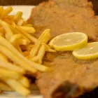 La imagen 1 de la Empresa ASADOR LA CANDELARIA Restaurante especializado en asados en San Isidro AR-B