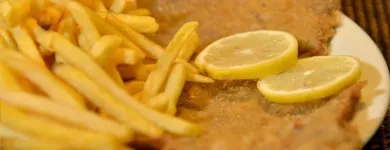 La imagen 1 de la Empresa ASADOR LA CANDELARIA Restaurante especializado en asados en San Isidro AR-B